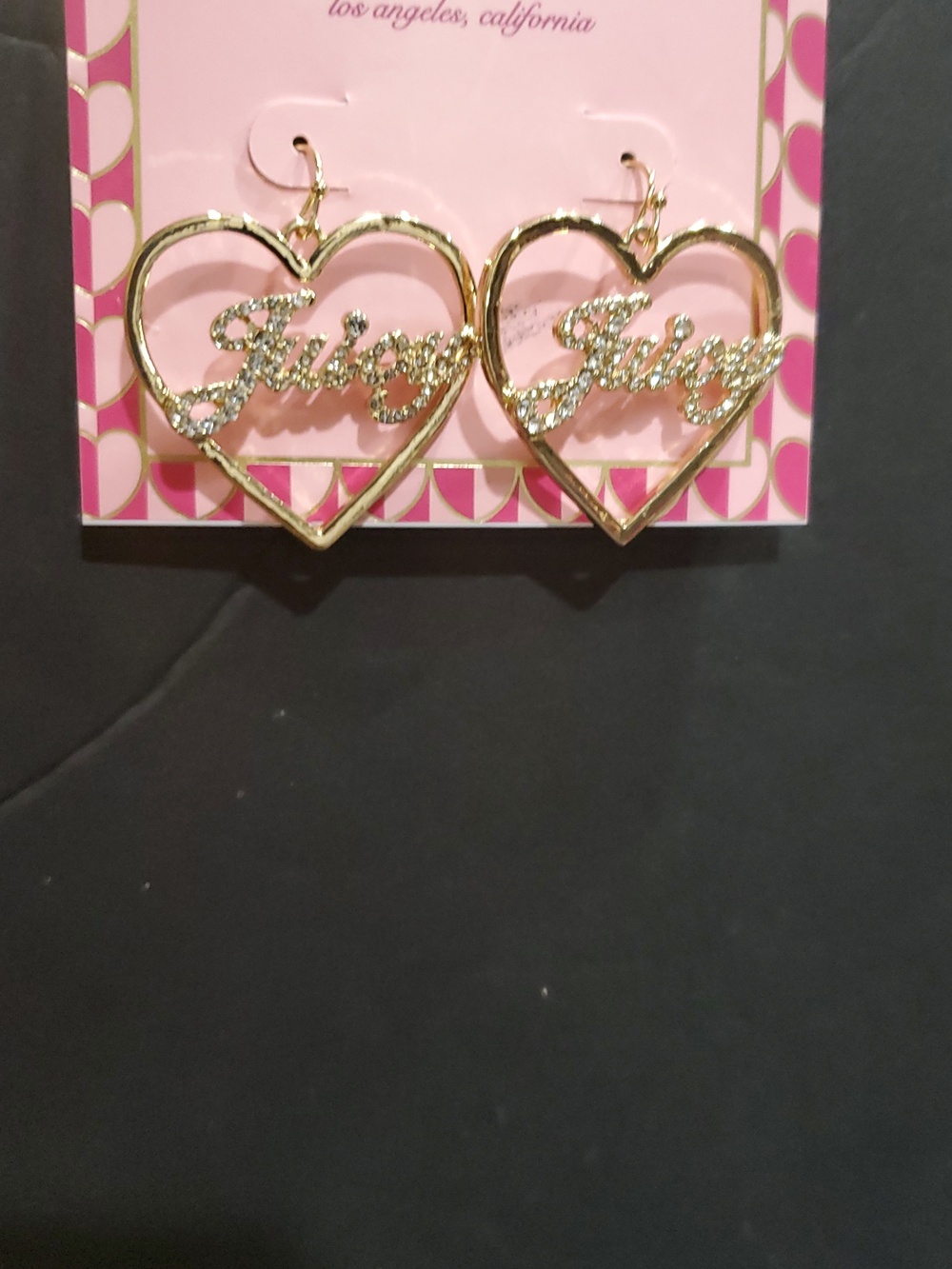 Juicy Couture gold tone heart shaped pave studded Juicy monogram dangle earrings